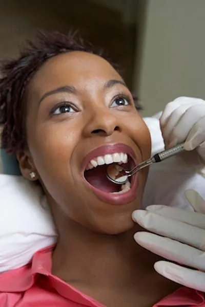 woman getting dental care at Ronald Furhmann DDS