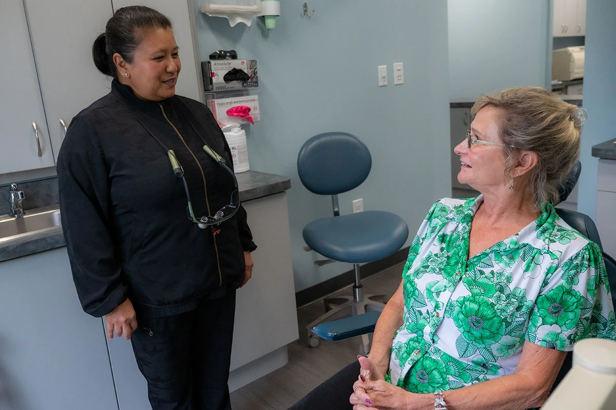 Our friendly dental team speaking with a senior patient about our faciel aesthetics dentistry options at Ronald Fuhrmann - Virginia Beach VA.