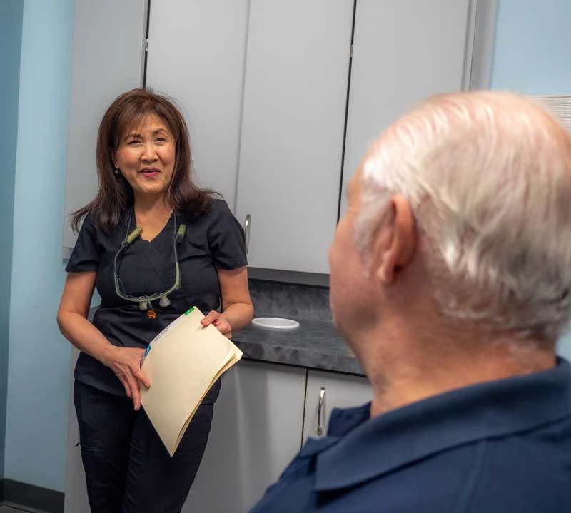 Senior patient discussing sleep apnea treatment options at Virginia Beach VA.