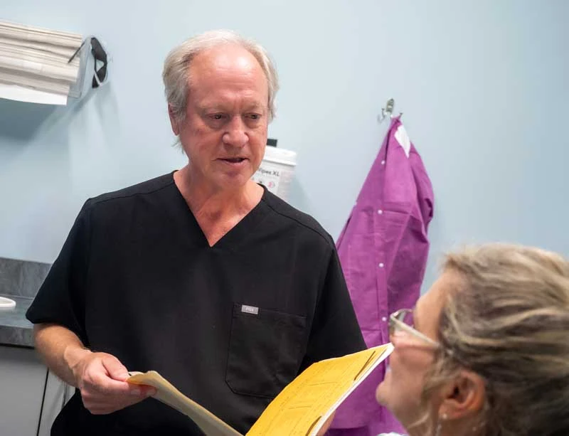 Dentist, Dr Fuhrmann discussing sleep apnea treatment options at Ronald Fuhrmann - Virginia Beach VA.